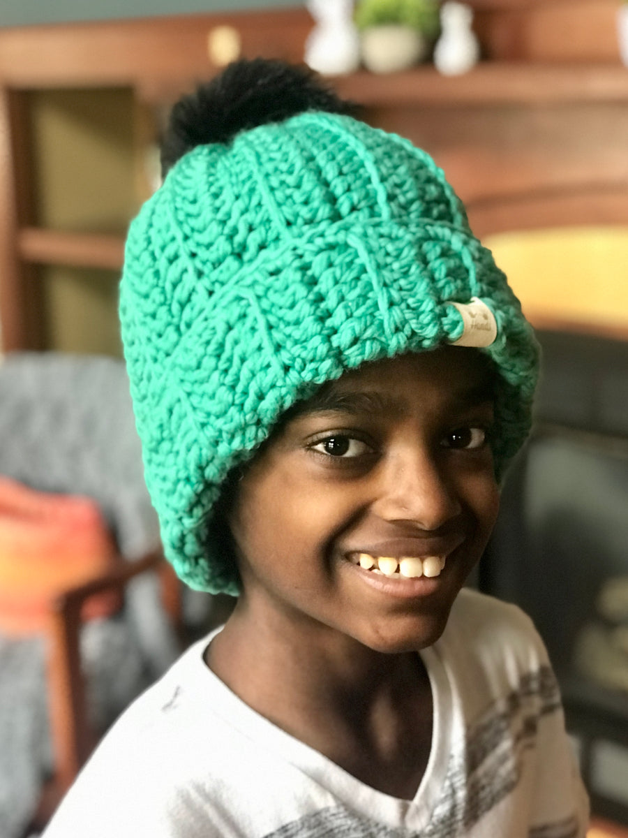 Simplicity 43-40023 Jonah's Hands DIY Hat Beginners Crochet Kit for Kids and Adults, Finished Project 7.5 x 26, Multicolor